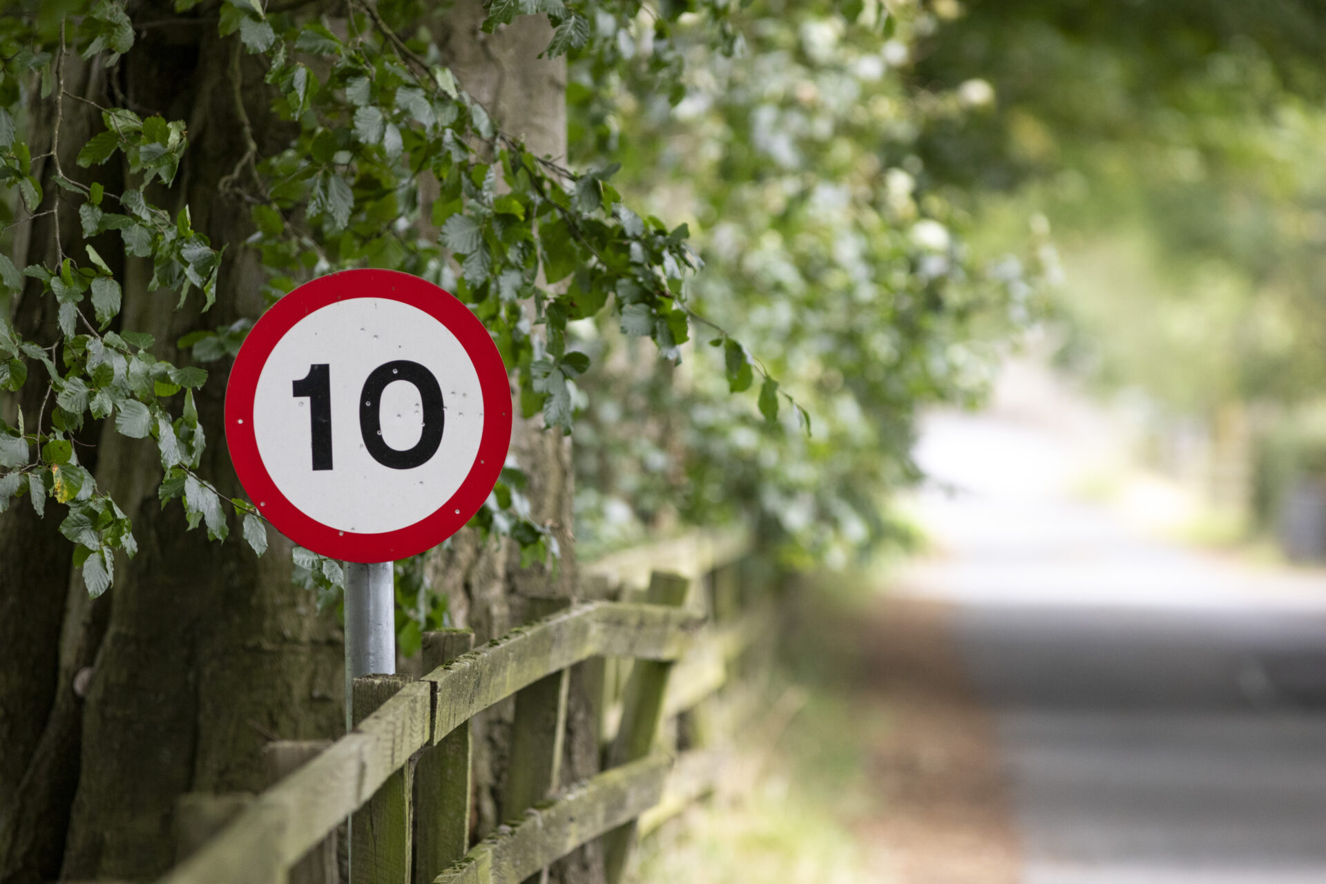 10 mph sign on a road