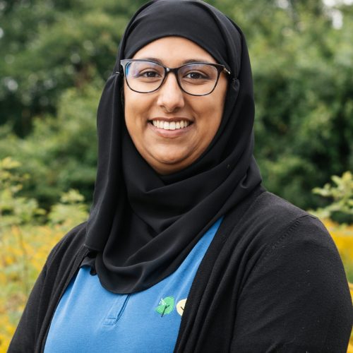 Ikra smiling at the camera